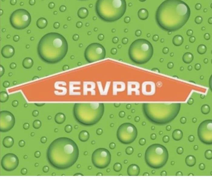 SERVPRO logo with light green background and water spots